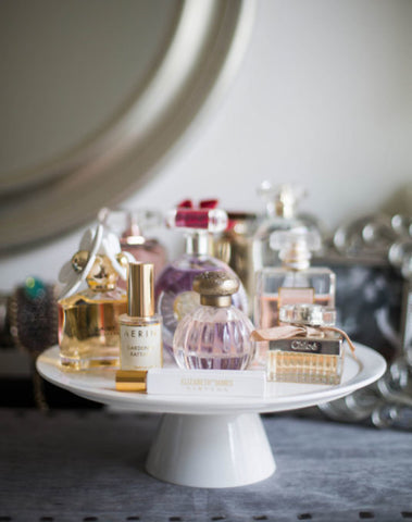 Perfumes on a cake stand
